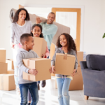 young family moving into a home